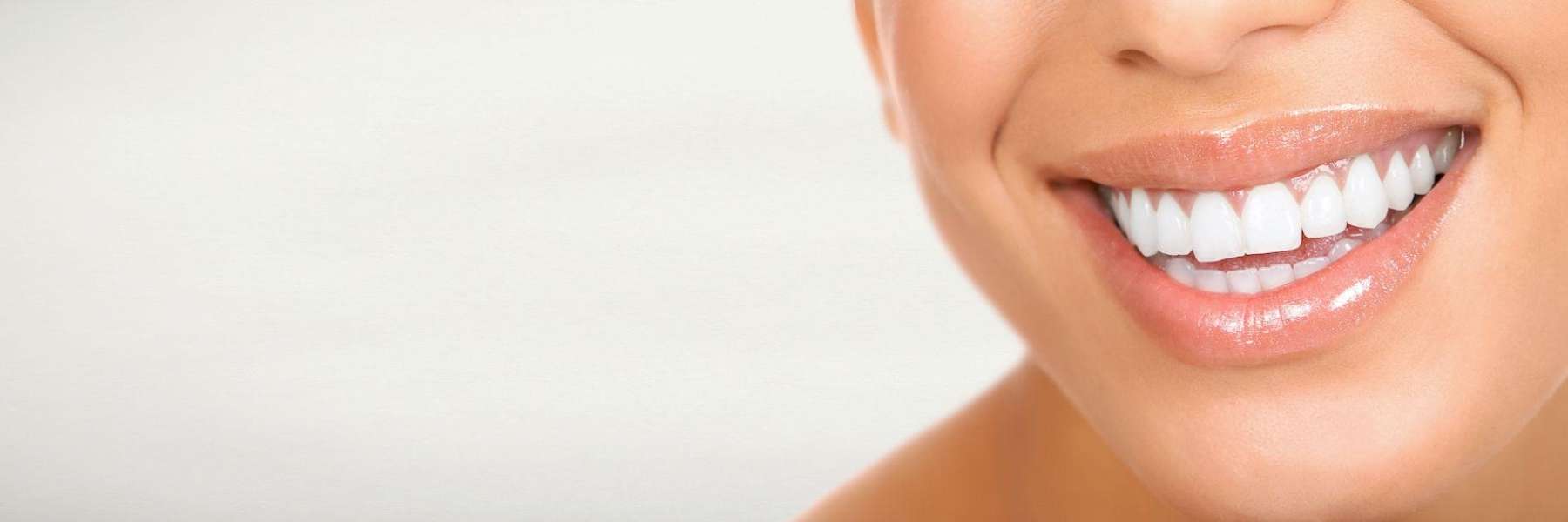 Woman’s bright smile showcases cosmetic dentistry’s stunning results.