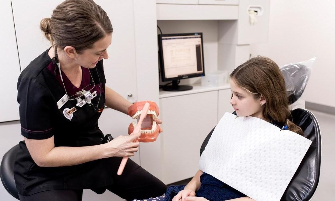 Dr. Annie discussing best practices for oral hygiene